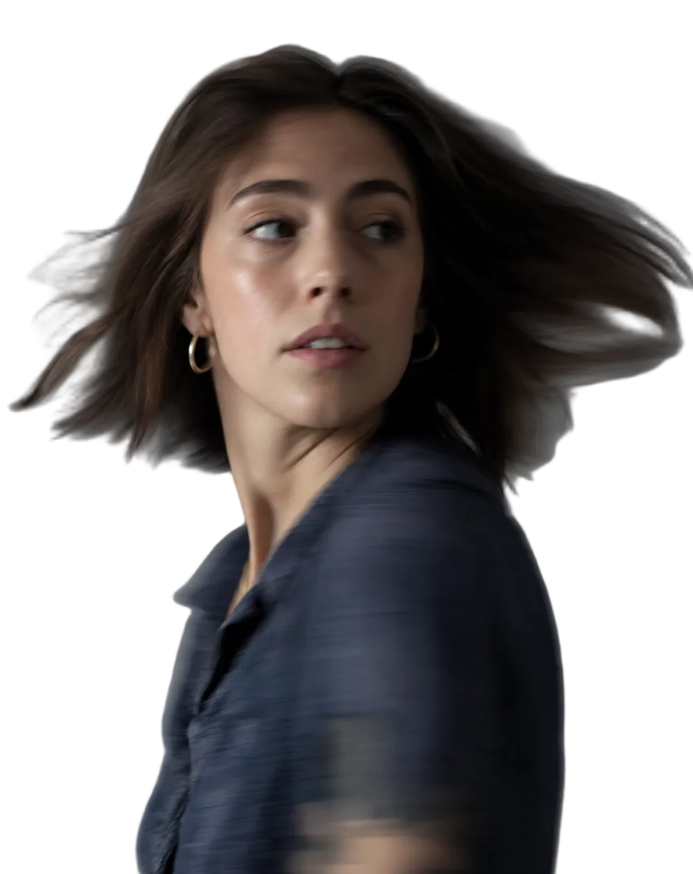 A subject mid-turn with motion blur, edges held stable across the movement